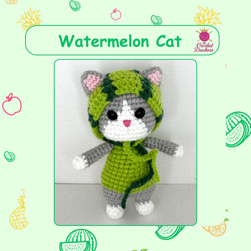 A crocheted amigurumi cat doll wearing a green watermelon-patterned hood and dress, with pink inner ears, black eyes, and a small pink heart on its face. The image is framed with a green border and watermelon-themed illustrations, with the text 'Watermelon Cat' and a 'The Crochet Duchess' logo.