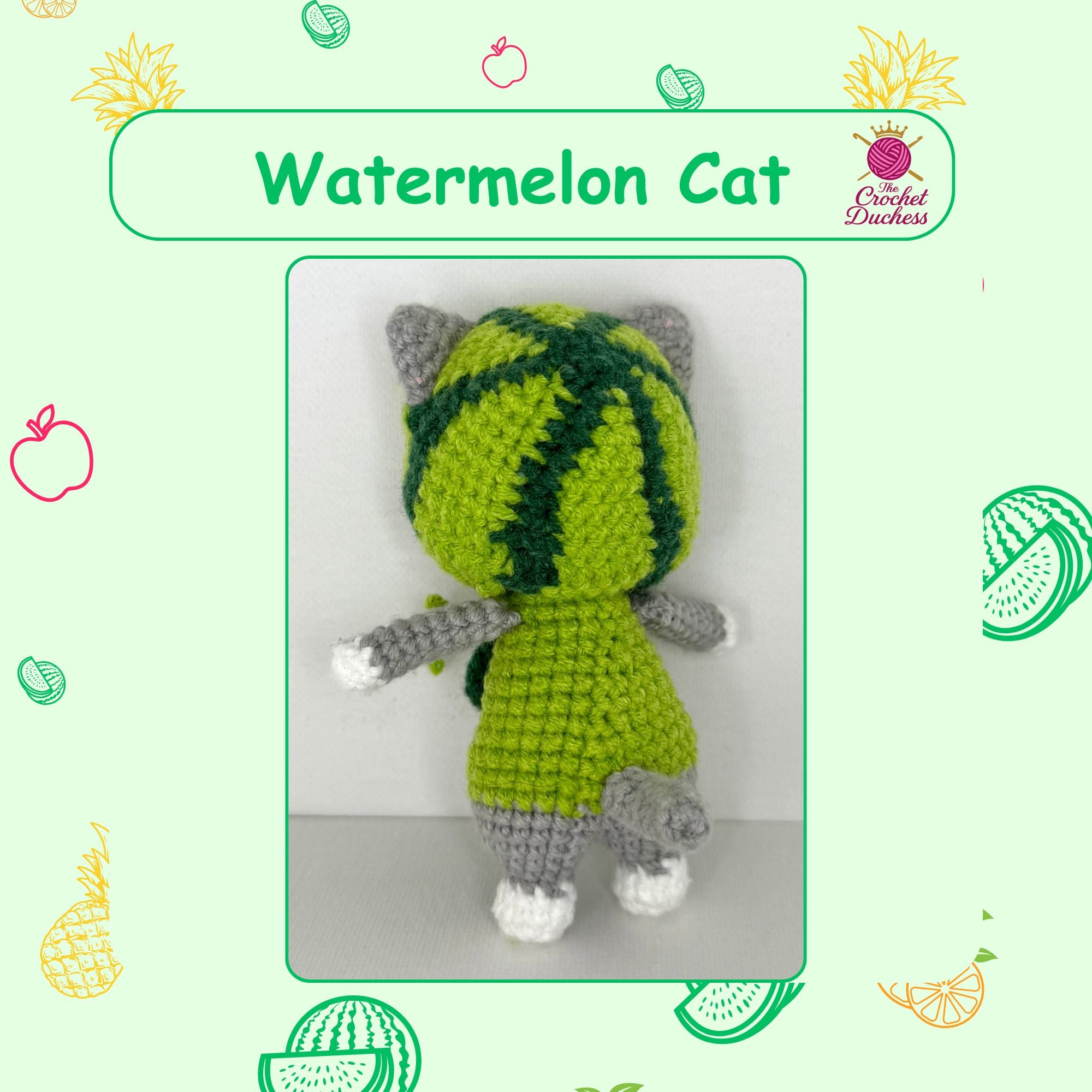 A crocheted watermelon-themed cat toy shown from the back, featuring a bright green body with dark green watermelon stripes, gray ears and paws, and white paws and feet. The image is presented on a light green background decorated with watermelon and fruit illustrations, with a header that reads 'Watermelon Cat' and a 'The Crochet Duchess' brand logo.