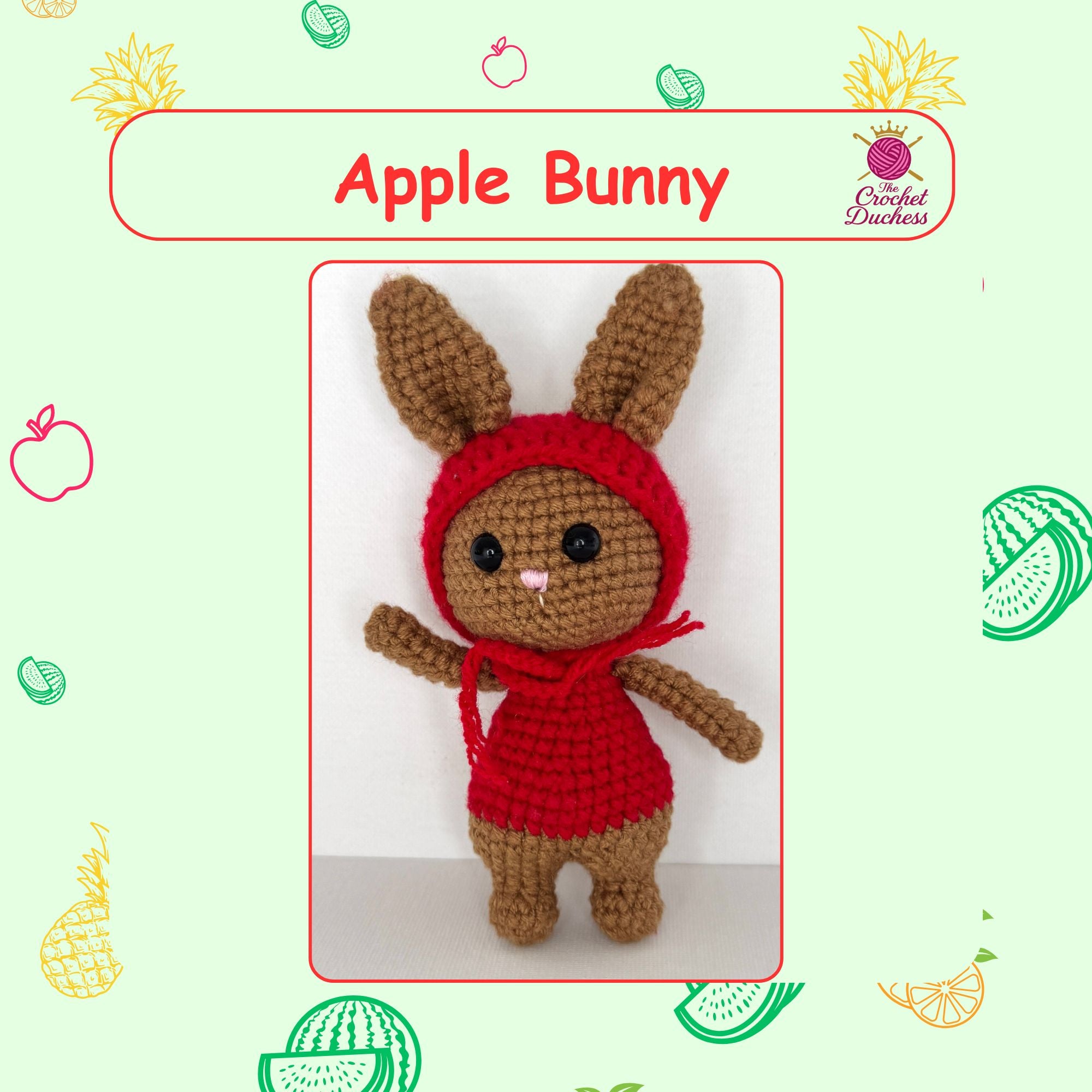 A crocheted plush bunny doll wearing a red hood and red dress, centered on a pale green decorative background with fruit illustrations and the text 'Apple Bunny' and 'The Crochet Duchess'.
